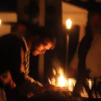 blacksmith over a fire